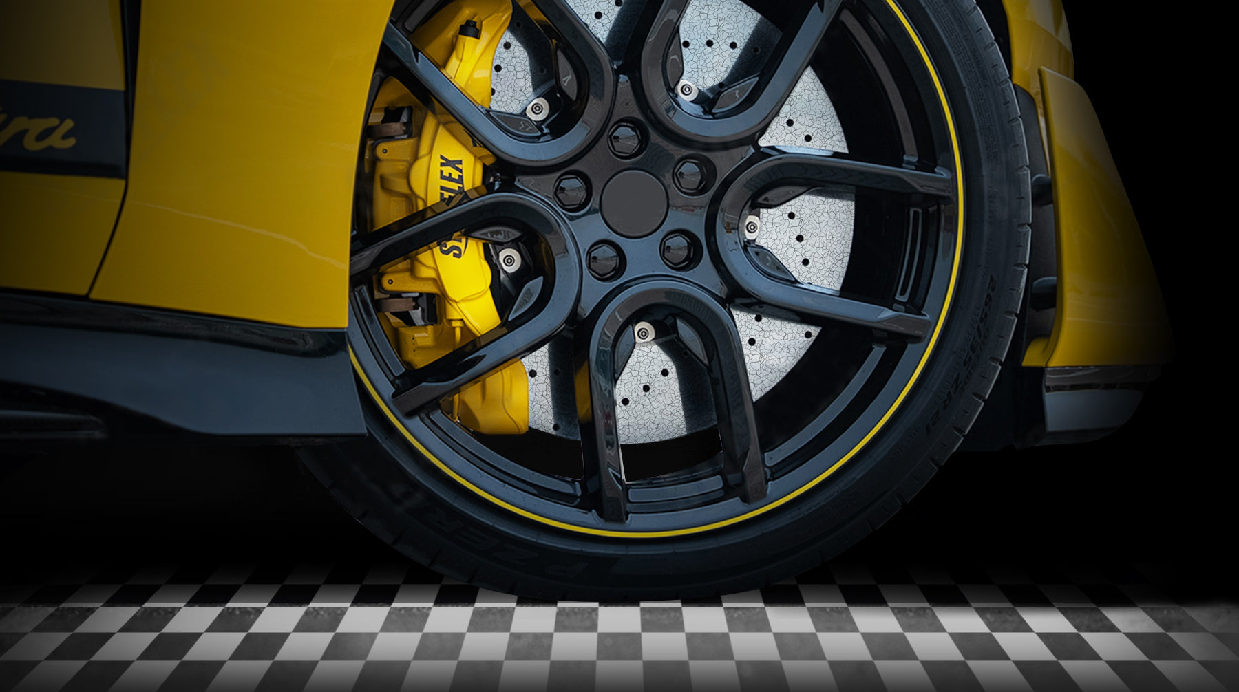 A banner showcases an enlarged display of a STOPFLEX long-fiber carbon ceramic disc, ready to race at any time!