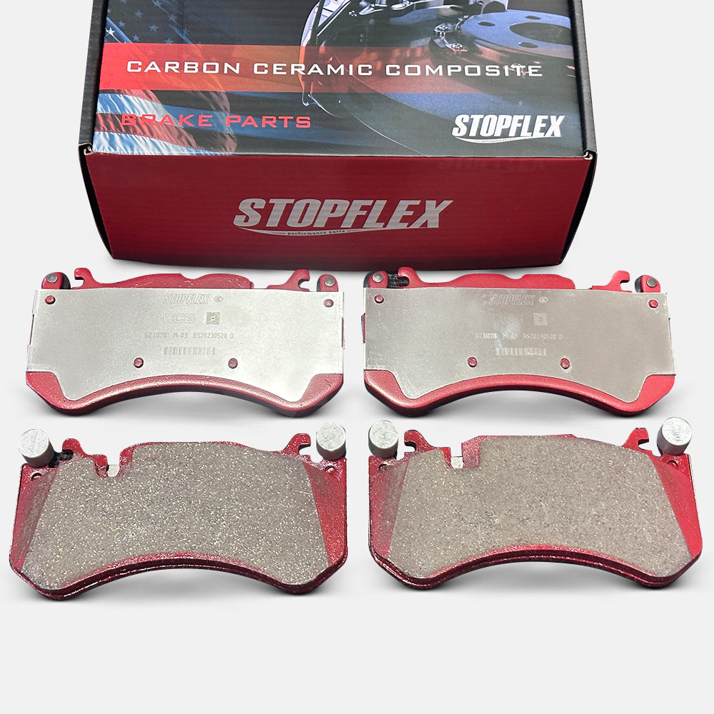 A set of STOPFLEX low-dust performance carbon ceramic brake pads for the Mercedes AMG C63 front wheel.