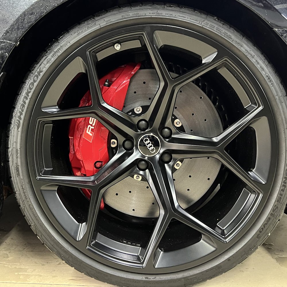 STOPFLEX carbon ceramic rotor installed on Audi RS6 front wheel with an OE Audi Akebono 10-pot brake caliper.
