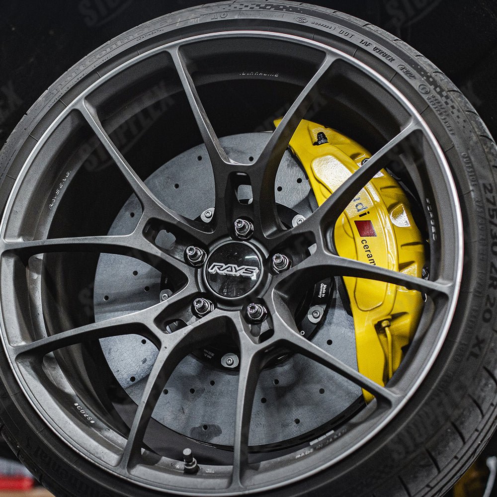 STOPFLEX carbon ceramic rotor installed on Audi RSQ8 front wheel with an OE Audi Akebono 10-pot brake caliper.